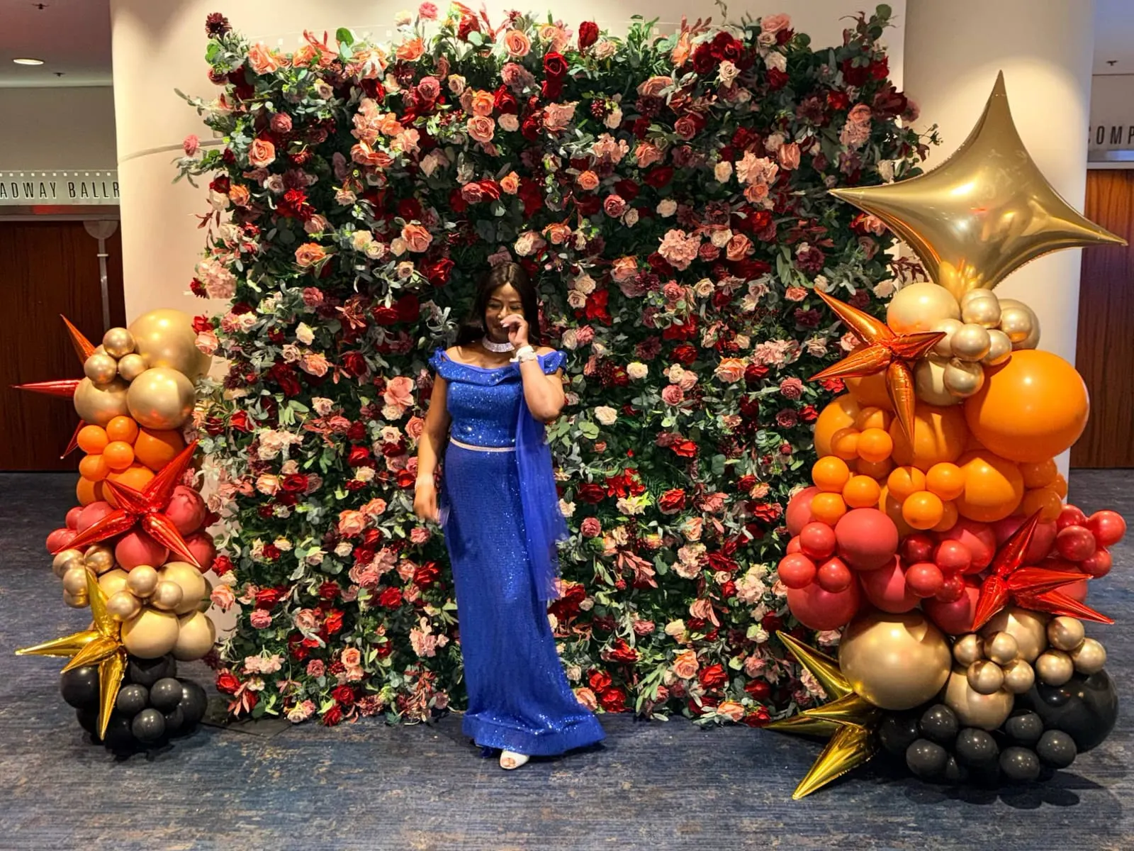 Floral backdrop styled for a bridal shower