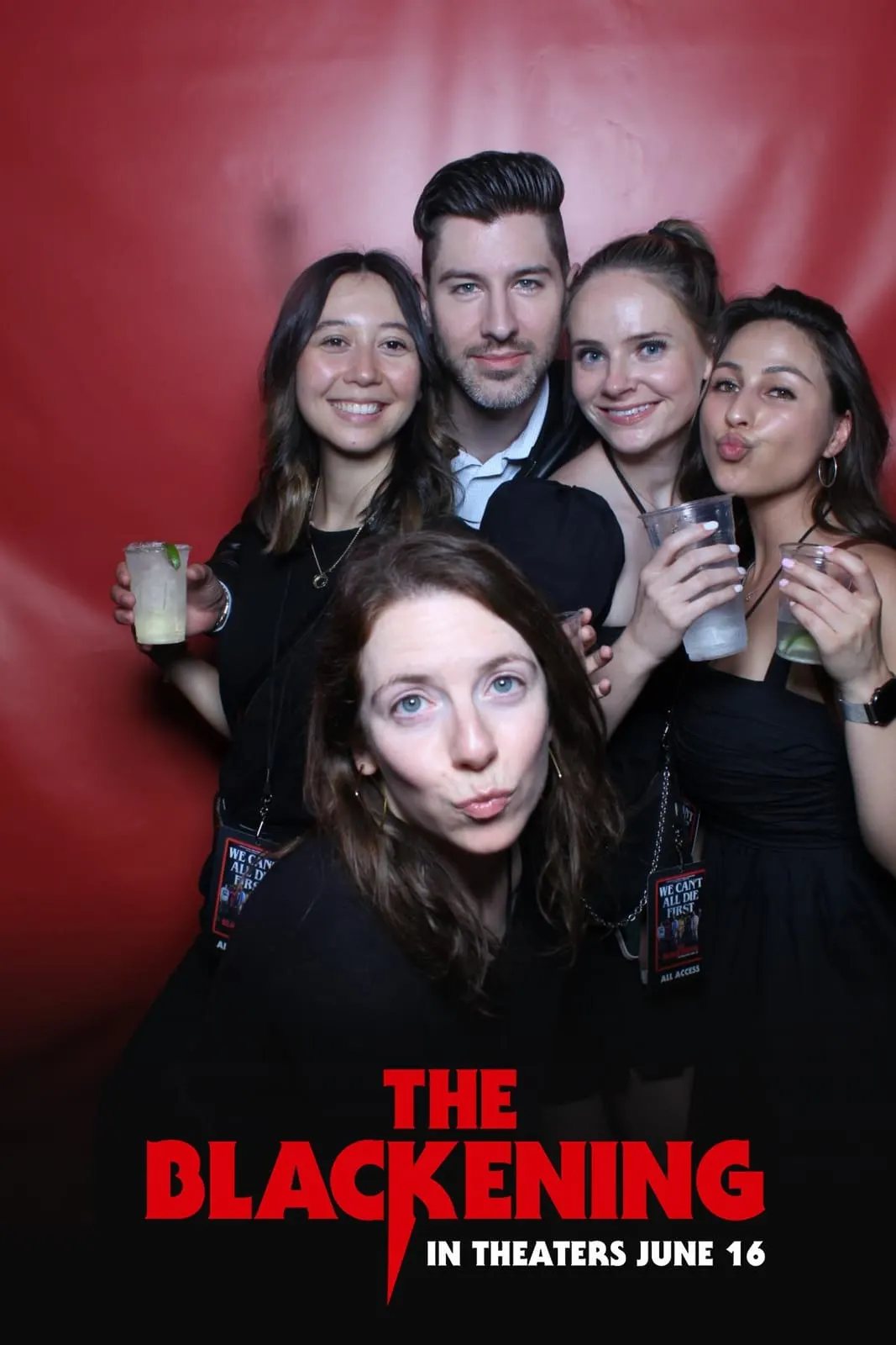Big group crowding the frame at The Blackening premiere photo booth