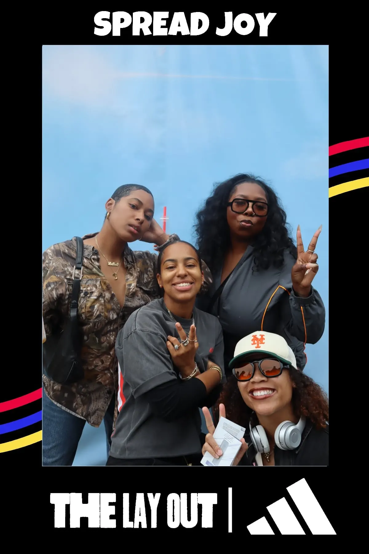 Four friends posing at The Lay Out x adidas Juneteenth event — Spread Joy print frame