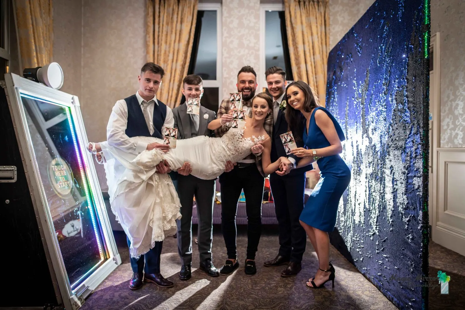 Group posing full length at the magic mirror