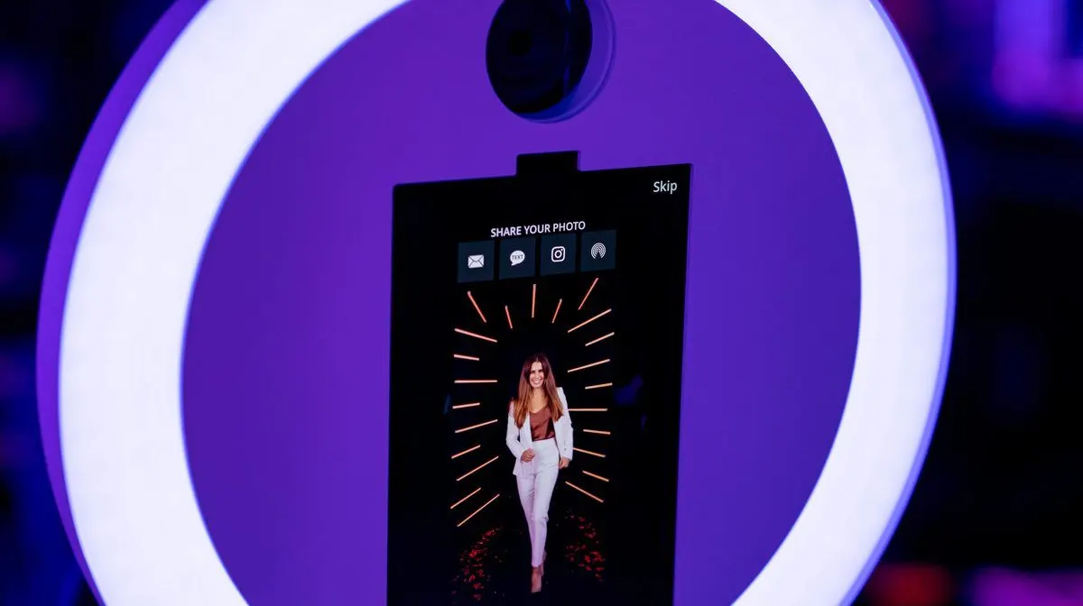 Guest inside the LED lined Vogue booth